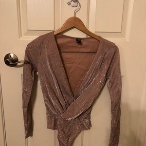 Sparkly pink bodysuit